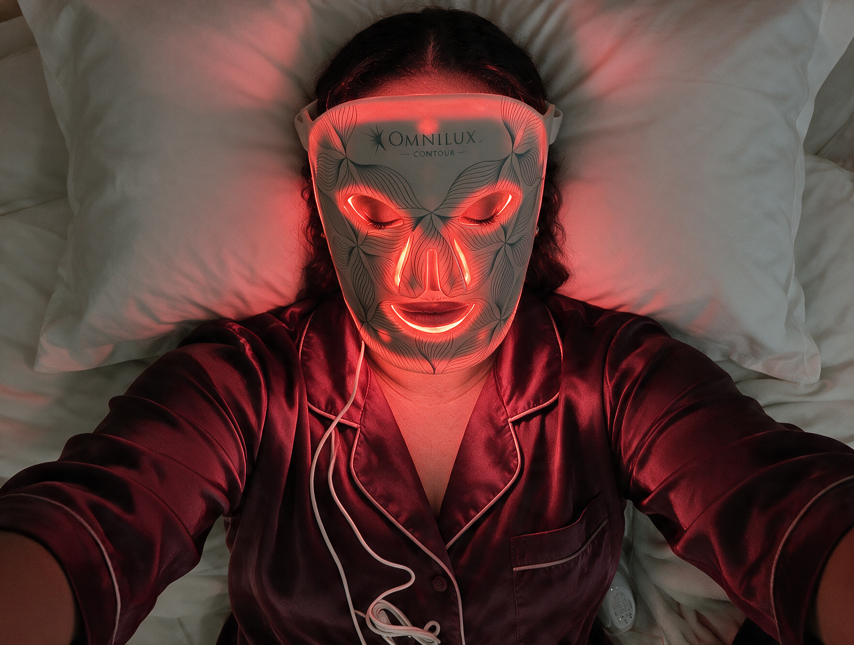 woman-wearing-omnilux-to-bed.png